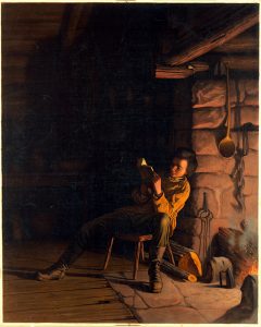 a boy reading late